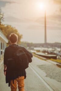 Man walking with a bag on his back