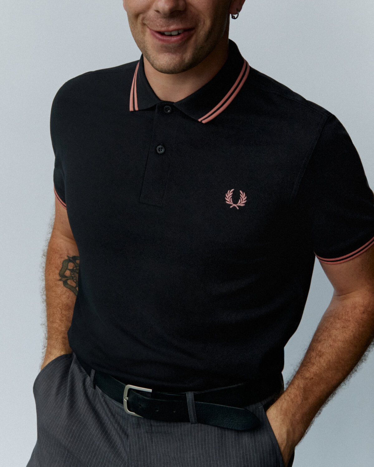 Close up of black Fred Perry polo shirt